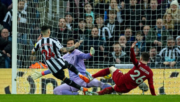 NEWCASTLE-UPON-TYNE, ENGLAND - Saturday, February 18, 2023: Liverpool's goalkeeper Alisson Becker makes s save from Newcastle United's Miguel Almirón during the FA Premier League match between Newcastle United FC and Liverpool FC at St. James' Park. (Pic by David Rawcliffe/Propaganda)