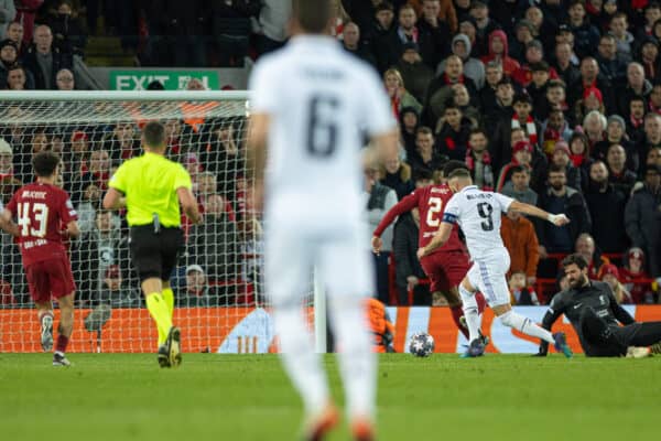 LIVERPOOL, ENGLAND - Tuesday, February 21, 2023: Real Madrid's captain Karim Benzema scores the fifth goal during the UEFA Champions League Round of 16 1st Leg game between Liverpool FC and Real Madrid at Anfield. (Pic by David Rawcliffe/Propaganda)