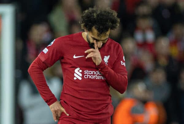 LIVERPOOL, ENGLAND - Tuesday, February 21, 2023: Liverpool's Mohamed Salah looks dejected after Real Madrid's captain Karim Benzema scored the fifth goal during the UEFA Champions League Round of 16 1st Leg game between Liverpool FC and Real Madrid at Anfield. (Pic by David Rawcliffe/Propaganda)