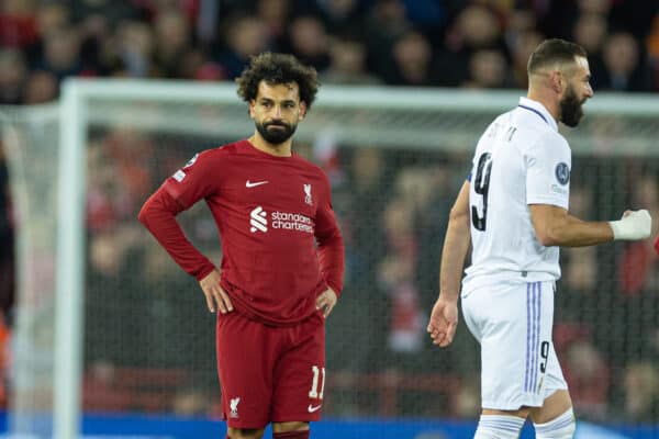 LIVERPOOL, ENGLAND - Tuesday, February 21, 2023: Liverpool's Mohamed Salah looks dejected after Real Madrid's captain Karim Benzema scored the fifth goal during the UEFA Champions League Round of 16 1st Leg game between Liverpool FC and Real Madrid at Anfield. (Pic by David Rawcliffe/Propaganda)