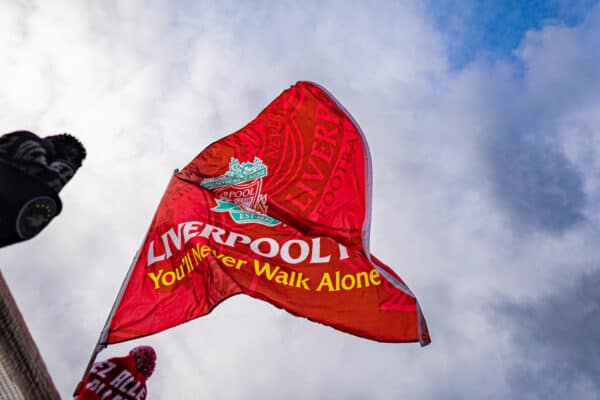 LIVERPOOL, ENGLAND - Sunday, March 5, 2023: A Liverpool flag flutters in the wind before the FA Premier League match between Liverpool FC and Manchester United FC at Anfield. (Pic by David Rawcliffe/Propaganda)