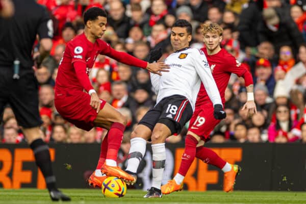 LIVERPOOL, ENGLAND - Sunday, March 5, 2023: Manchester United's Carlos Henrique Casimiro (C) is challenged by Liverpool's Cody Gakpo during the FA Premier League match between Liverpool FC and Manchester United FC at Anfield. (Pic by David Rawcliffe/Propaganda)