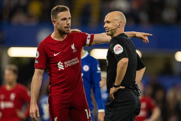 LONDON, ENGLAND - Tuesday, April 4, 2023: Liverpool's captain Jordan Henderson (L) speaks to referee Anthony Taylor during the FA Premier League match between Chelsea FC and Liverpool FC at Stamford Bridge. (Pic by David Rawcliffe/Propaganda)