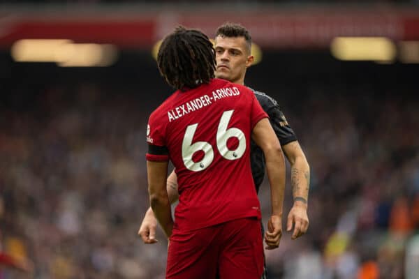 LIVERPOOL, ENGLAND - Sunday, April 9, 2023: Liverpool's Trent Alexander-Arnold (L) challenges Arsenal's Granit Xhaka during the FA Premier League match between Liverpool FC and Arsenal FC at Anfield. (Pic by David Rawcliffe/Propaganda)