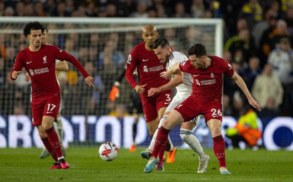 LEEDS, ENGLAND - Monday, April 17, 2023: Leeds United's Jack Harrison (C)is challenged by Liverpool's Andy Robertson during the FA Premier League match between Leeds United FC and Liverpool FC at Elland Road. (Pic by David Rawcliffe/Propaganda)