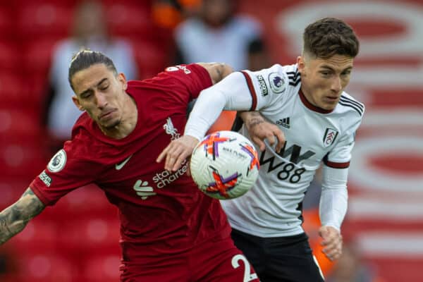 LIVERPOOL, ENGLAND - Wednesday, May 3, 2023: Liverpool's Kostas Tsimikas is challenged by Fulham's Harry Wilson (R) during the FA Premier League match between Liverpool FC and Fulham FC at Anfield. (Pic by David Rawcliffe/Propaganda)