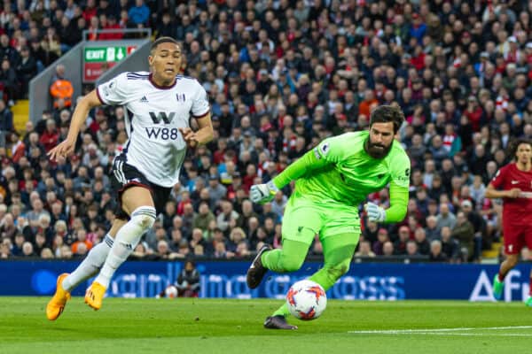 LIVERPOOL, ENGLAND - Wednesday, May 3, 2023: Fulham's Carlos Vinícius (L) goes around Liverpool's goalkeeper Alisson Becker during the FA Premier League match between Liverpool FC and Fulham FC at Anfield. (Pic by David Rawcliffe/Propaganda)