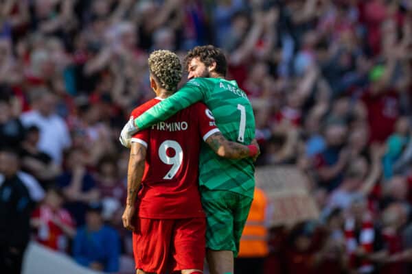 LIVERPOOL, ENGLAND - Saturday, May 20, 2023: Liverpool's Roberto Firmino says an emotional goodbye to the supporters as team-mate goalkeeper Alisson Becker embraces him after the FA Premier League match between Liverpool FC and Aston Villa FC at Anfield. (Pic by David Rawcliffe/Propaganda)