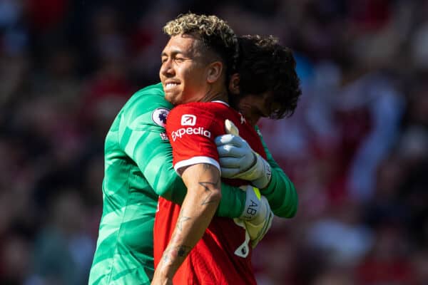 LIVERPOOL, ENGLAND - Saturday, May 20, 2023: Liverpool's Roberto Firmino (L) is embraced by Brazil international team-mate goalkeeper Alisson Becker after the FA Premier League match between Liverpool FC and Aston Villa FC at Anfield. (Pic by David Rawcliffe/Propaganda)