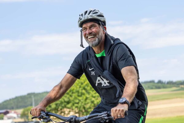 DONESCHINGEN, GERMANY - Monday, July 17, 2023: Liverpool's manager Jürgen Klopp (R) rides a bike back to the team hotel after a training session during the club's pre-season preparations in Germany. (Pic by David Rawcliffe/Propaganda)