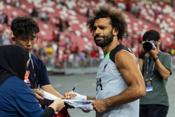 SINGAPORE - Saturday, July 29, 2023: Liverpool's Mohamed Salah signs autographs for supporters after a training session ahead of the pre-season friendly match between Liverpool FC and Leicester City FC at the Singapore National Stadium. (Pic by David Rawcliffe/Propaganda)
