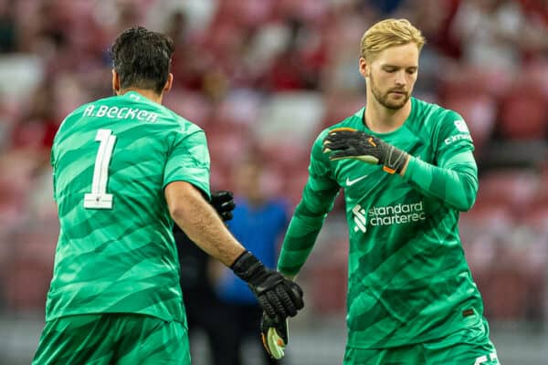 SINGAPORE - Sunday, July 30, 2023: Liverpool's goalkeeper Caoimhin Kelleher is substituted for goalkeeper Alisson Becker during a pre-season friendly match between Liverpool FC and Leicester City FC at the Singapore National Stadium. (Pic by David Rawcliffe/Propaganda)