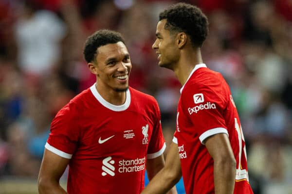 SINGAPORE - Wednesday, August 2, 2023: Liverpool's Cody Gakpo (R) celebrates with team-mate Trent Alexander-Arnold after scoring the first goal during a pre-season friendly match between Liverpool FC and FC Bayern Munich FC at the Singapore National Stadium. (Pic by David Rawcliffe/Propaganda)