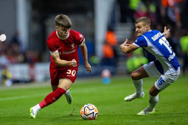 PRESTON, ENGLAND - Monday, August 7, 2023: Liverpool's Ben Doak (L) gets away from SV Darmstadt 98's Fabian Nürnberger during a pre-season friendly match between Liverpool FC and SV Darmstadt 98 at Deepdale. (Pic by David Rawcliffe/Propaganda)