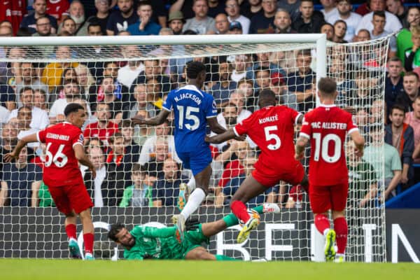 LONDON, ENGLAND - Sunday, August 13, 2023: Liverpool's goalkeeper Alisson Becker makes a save from Chelsea's Nicolas Jackson during the FA Premier League match between Chelsea FC and Liverpool FC at Stamford Bridge. (Pic by David Rawcliffe/Propaganda)