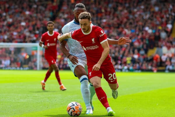 LIVERPOOL, ENGLAND - Saturday, August 19, 2023: Liverpool's Diogo Jota (R) is challenged by Bournemouth's Antoine Semenyo during the FA Premier League match between Liverpool FC and AFC Bournemouth at Anfield. (Pic by David Rawcliffe/Propaganda)