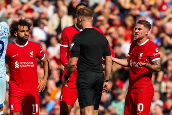 LIVERPOOL, ENGLAND - Saturday, August 19, 2023: Liverpool's Alexis Mac Allister (R) is sent off by Referee Thomas Bramall after a high challenge on Bournemouth's Ryan Christie during the FA Premier League match between Liverpool FC and AFC Bournemouth at Anfield. (Pic by David Rawcliffe/Propaganda)