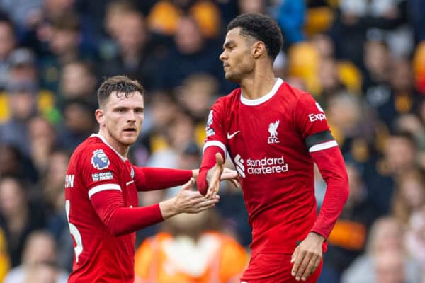 WOLVERHAMPTON, ENGLAND - Saturday, September 16, 2023: Liverpool's Cody Gakpo (R) celebrates with team-mate Andy Robertson after scoring the first equalising goal during the FA Premier League match between Wolverhampton Wanderers FC and Liverpool FC at Molineux Stadium. (Pic by David Rawcliffe/Propaganda)