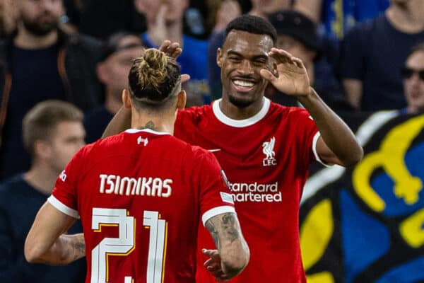 LIVERPOOL, ENGLAND - Thursday, October 5, 2023: Liverpool's Ryan Gravenberch (R) celebrates with team-mate Kostas Tsimikas after scoring the opening goal during the UEFA Europa League Group E matchday 2 game between Liverpool FC and Union SG at Anfield. (Pic by David Rawcliffe/Propaganda)