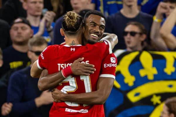 LIVERPOOL, ENGLAND - Thursday, October 5, 2023: Liverpool's Ryan Gravenberch (R) celebrates with team-mate Kostas Tsimikas after scoring the opening goal during the UEFA Europa League Group E matchday 2 game between Liverpool FC and Union SG at Anfield. (Pic by David Rawcliffe/Propaganda)