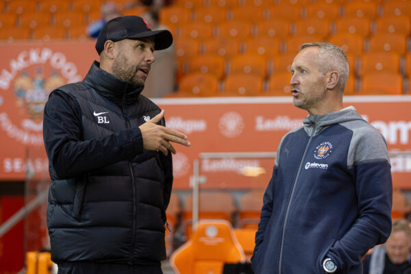 BLACKPOOL, ENGLAND - Tuesday, October 10, 2023: Liverpool's head coach Barry Lewtas (L) and Blackpool's manager Neil Critchley before the English Football League Trophy Northern Group A match between Blackpool FC and Liverpool FC Under-21's at Bloomfield Road. (Photo by David Rawcliffe/Propaganda)