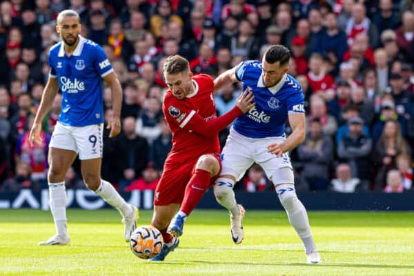 LIVERPOOL, ENGLAND - Saturday, October 21, 2023: Liverpool's Alexis Mac Allister (L) is challenged by Everton's Jack Harrison during the FA Premier League match between Liverpool FC and Everton FC, the 243rd Merseyside Derby, at Anfield. (Photo by David Rawcliffe/Propaganda)