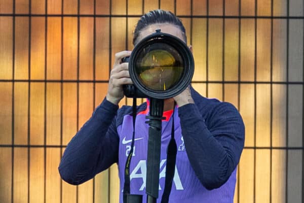 LIVERPOOL, ENGLAND - Wednesday, October 25, 2023: Liverpool's Kostas Tsimikas plays with a photographer's camera during a training session at the AXA Training Centre ahead of the UEFA Europa League Group E match between Liverpool FC and FC Toulouse. (Photo by David Rawcliffe/Propaganda)