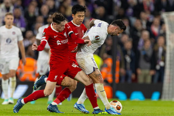 LIVERPOOL, ENGLAND - Thursday, October 26, 2023: Liverpool's Luke Chambers (L) and Wataru Endo (C) challenge Toulouse's Aron Dønnum during the UEFA Europa League Group E matchday 3 game between Liverpool FC and Toulouse FC at Anfield. (Photo by David Rawcliffe/Propaganda)