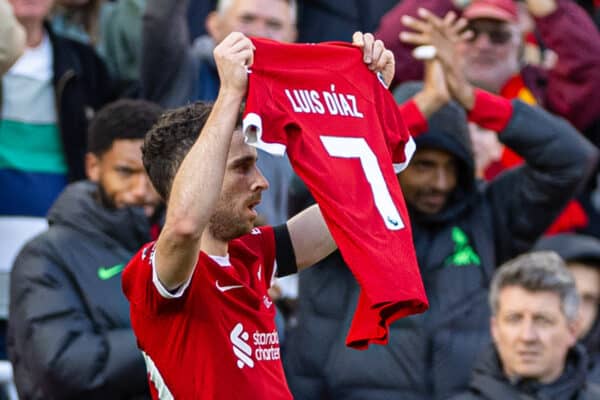 LIVERPOOL, ENGLAND - Sunday, October 29, 2023: Liverpool's Diogo Jota celebrates after scoring the opening goal by displaying the shirt of team-mate Luis Díaz, who's parents were kidnaped in Colombia, during the FA Premier League match between Liverpool FC and Nottingham Forest FC at Anfield. (Photo by David Rawcliffe/Propaganda)