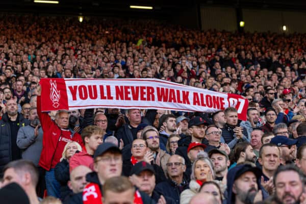 LIVERPOOL, ENGLAND - Sunday, October 29, 2023: Liverpool supporters with a "You'll Never Walk Alone" scarf during the FA Premier League match between Liverpool FC and Nottingham Forest FC at Anfield. (Photo by David Rawcliffe/Propaganda)