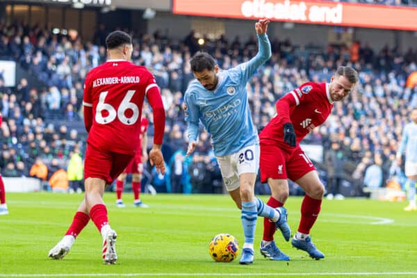 MANCHESTER, ENGLAND - Saturday, November 25, 2023: Manchester City's Bernardo Silva is dispossed by Liverpool's Alexis Mac Allister during the FA Premier League match between Manchester City FC and Liverpool FC at the City of Manchester Stadium. (Photo by David Rawcliffe/Propaganda)