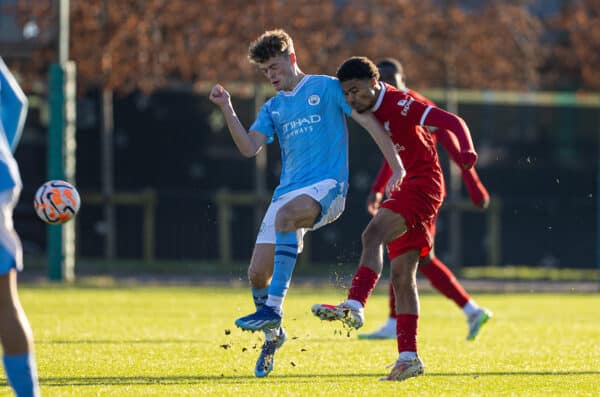 MANCHESTER, ENGLAND - Saturday, December 2, 2023: Manchester City's Matty Warhurst (L) is challenged by Liverpool's Kyle Kelly during the Under-18 Premier League match between Liverpool FC Under-18's and Manchester City FC Under-18's at the Etihad Campus. (Photo by David Rawcliffe/Propaganda)