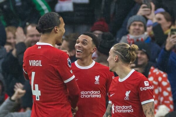 LIVERPOOL, ENGLAND - Sunday, December 3, 2023: Liverpool's Trent Alexander-Arnold (C) celebrates with team-mate captain Virgil van Dijk (L) after scoring the first goal during the FA Premier League match between Liverpool FC and Fulham FC at Anfield. (Photo by David Rawcliffe/Propaganda)