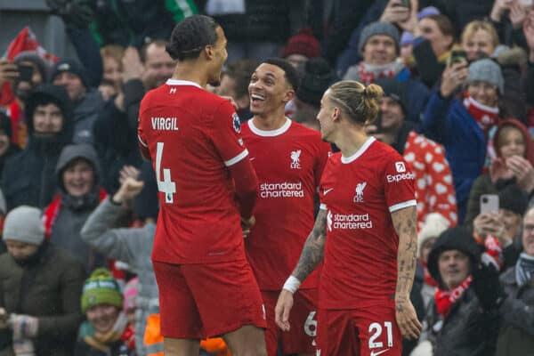 LIVERPOOL, ENGLAND - Sunday, December 3, 2023: Liverpool's Trent Alexander-Arnold (C) celebrates with team-mate captain Virgil van Dijk (L) after scoring the first goal during the FA Premier League match between Liverpool FC and Fulham FC at Anfield. (Photo by David Rawcliffe/Propaganda)