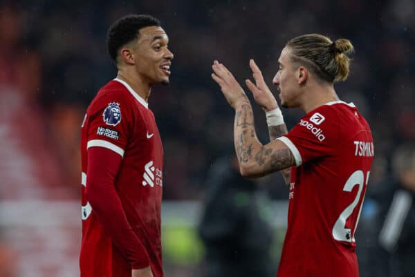 LIVERPOOL, ENGLAND - Sunday, December 3, 2023: Liverpool's match-winning goal-scorer Trent Alexander-Arnold (L) celebrates with team-mate Kostas Tsimikas after the FA Premier League match between Liverpool FC and Fulham FC at Anfield. Liverpool won 4-3. (Photo by David Rawcliffe/Propaganda)