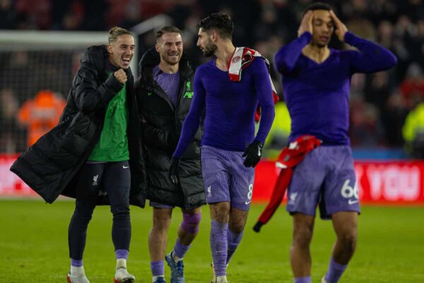 SHEFFIELD, ENGLAND - Wednesday, December 6, 2023: Liverpool's second goal-scorer Dominik Szoboszlai (R) celebrates with team-mates Kostas Tsimikas (L) and Alexis Mac Allister (C) after the FA Premier League match between Sheffield United FC and Liverpool FC at Bramall Lane. Liverpool won 2-0. (Photo by David Rawcliffe/Propaganda)