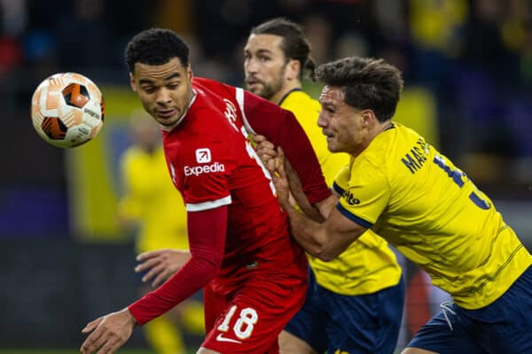 BRUSSELS, BELGIUM - Thursday, December 14, 2023: Liverpool's Cody Gakpo (L) and Union SG's Kevin Mac Allister during the UEFA Europa League Group E matchday 6 game between Royale Union Saint-Gilloise and Liverpool FC at the Constant Vanden Stock Stadium. (Photo by David Rawcliffe/Propaganda)