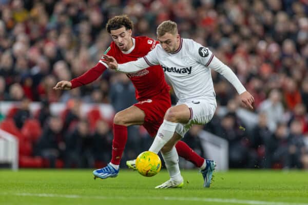  West Ham United's Jarrod Bowen (R) is challenged by Liverpool's Curtis Jones during the Football League Cup Quarter-Final match between Liverpool FC and West Ham United FC at Anfield. (Photo by David Rawcliffe/Propaganda)