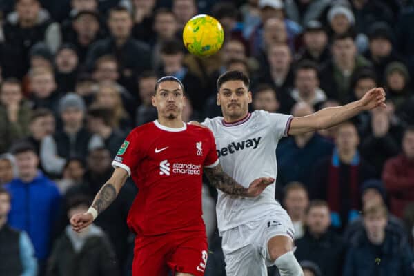 LIVERPOOL, ENGLAND - Wednesday, December 20, 2023: Liverpool's Darwin Núñez (L) and West Ham United's Konstantinos Mavropanos during the Football League Cup Quarter-Final match between Liverpool FC and West Ham United FC at Anfield. (Photo by David Rawcliffe/Propaganda)