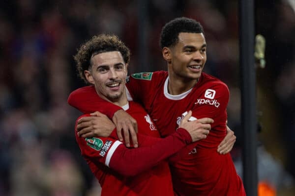 LIVERPOOL, ENGLAND - Wednesday, December 20, 2023: Liverpool's Curtis Jones (L) celebrates with team-mate Cody Gakpo after scoring the second goal, the club's 500th in the competition. during the Football League Cup Quarter-Final match between Liverpool FC and West Ham United FC at Anfield. (Photo by David Rawcliffe/Propaganda)