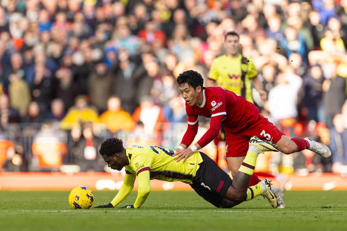 LIVERPOOL, ENGLAND - Saturday, February 10, 2024: Burnley's Nathan Tella' (L) is challenged by Liverpool's Wataru Endo during the FA Premier League match between Liverpool FC and Burnley FC at Anfield. (Photo by David Rawcliffe/Propaganda)