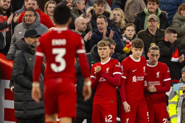 LIVERPOOL, ENGLAND - Saturday, February 10, 2024: Liverpool's substitutes Bobby Clark, James McConnell and Kostas Tsimikas prepare to come on during the FA Premier League match between Liverpool FC and Burnley FC at Anfield. (Photo by David Rawcliffe/Propaganda)