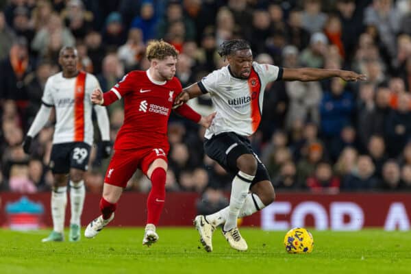 LIVERPOOL, ENGLAND - Wednesday, February 21, 2024: Liverpool's Harvey Elliott (L) challenges Luton Town's Teden Mengi during the FA Premier League match between Liverpool FC and Luton Town FC at Anfield. (Photo by David Rawcliffe/Propaganda)