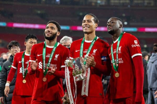 LONDON, ENGLAND - Sunday, February 25, 2024: Liverpool's (L-R) Joe Gomez, Virgil van Dijk and Ibrahima Konaté celebrate with the trophy after the Football League Cup Final match between Chelsea FC and Liverpool FC at Wembley Stadium. Liverpool won 1-0 after extra-time. (Photo by David Rawcliffe/Propaganda)