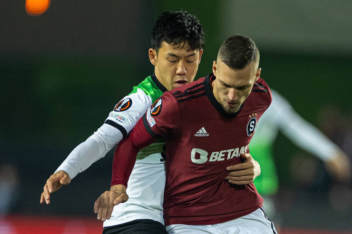 PRAGUE, CZECH REPUBLIC - Thursday, March 7, 2024: Liverpool's Wataru End? (L) ans Sparta Praha's Lukáš Haraslín during the UEFA Europa League Round of 16 1st Leg match between AC Sparta Praha and Liverpool FC at Stadion Letná. (Photo by David Rawcliffe/Propaganda)