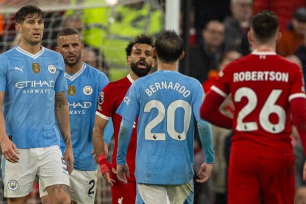 LIVERPOOL, ENGLAND - Sunday, March 10, 2024: Liverpool's Mohamed Salah (L) clashes with Manchester City's Bernardo Silva during the FA Premier League match between Liverpool FC and Manchester City FC at Anfield. (Photo by David Rawcliffe/Propaganda)