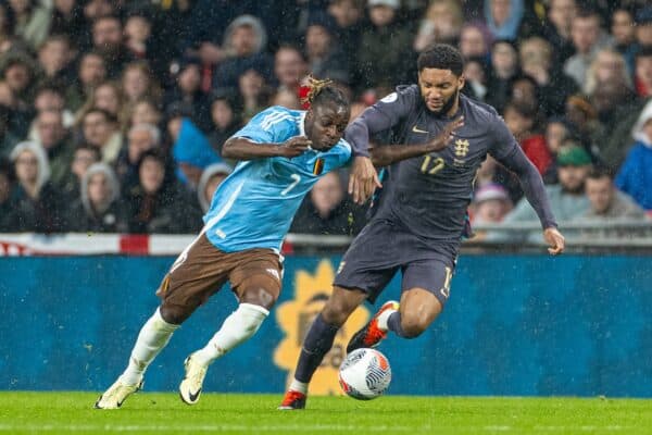 LONDON, ENGLAND - Tuesday, March 26, 2024: Belgium's Jérémy Doku (L) is challenged by England's substitute Joe Gomez during an International Friendly match between England and Belgium at Wembley Stadium. (Photo by David Rawcliffe/Propaganda)