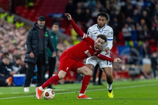 LIVERPOOL, ENGLAND - Thursday, April 11, 2024: Liverpool's Curtis Jones (L) is challenged by Atalanta's Éderson José dos Santos Lourenço da Silva during the UEFA Europa League Quarter-Final 1st Leg match between Liverpool FC and BC Atalanta at Anfield. (Photo by David Rawcliffe/Propaganda)