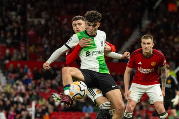 MANCHESTER, ENGLAND - Friday, April 12, 2024: Liverpool's substitute Stefan Bajcetic (R) is challenged by Manchester United's substitute James Scanlon during the Premier League 2 Division 1 match between Manchester United FC Under-21's and Liverpool FC Under-21's at Old Trafford. (Photo by David Rawcliffe/Propaganda)