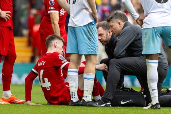 LIVERPOOL, ENGLAND - Sunday, April 14, 2024: Liverpool's Conor Bradley is treated for an injury during the FA Premier League match between Liverpool FC and Crystal Palace FC at Anfield. (Photo by David Rawcliffe/Propaganda)